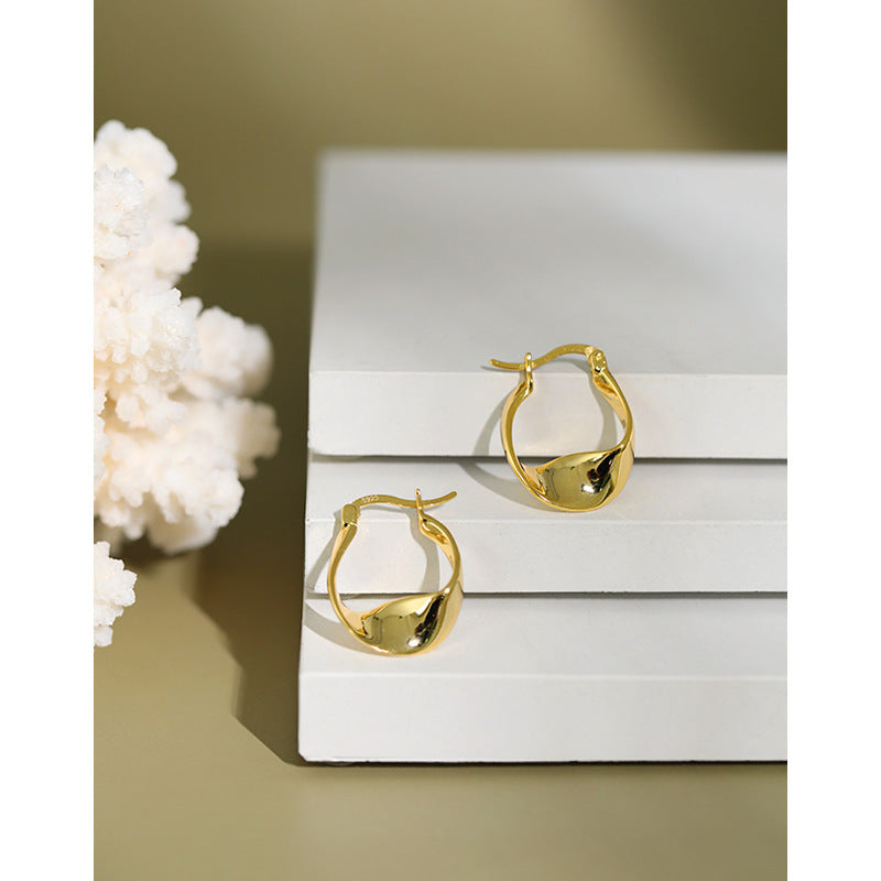 Women's sterling silver glossy twist earrings