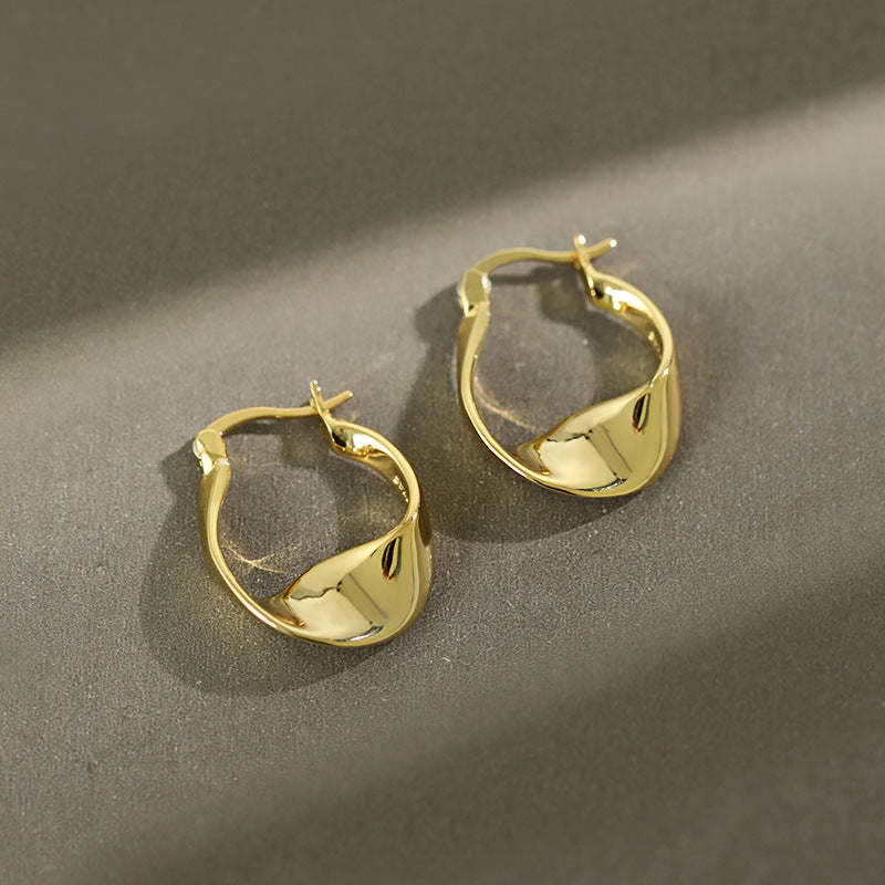 Women's sterling silver glossy twist earrings